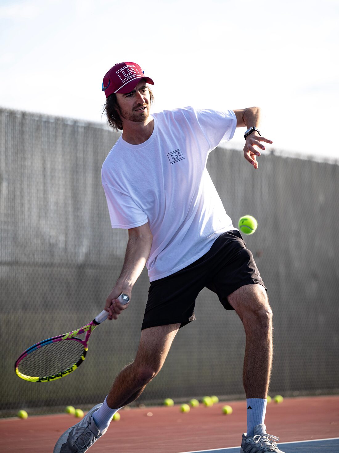Forehand follow-through in evening light